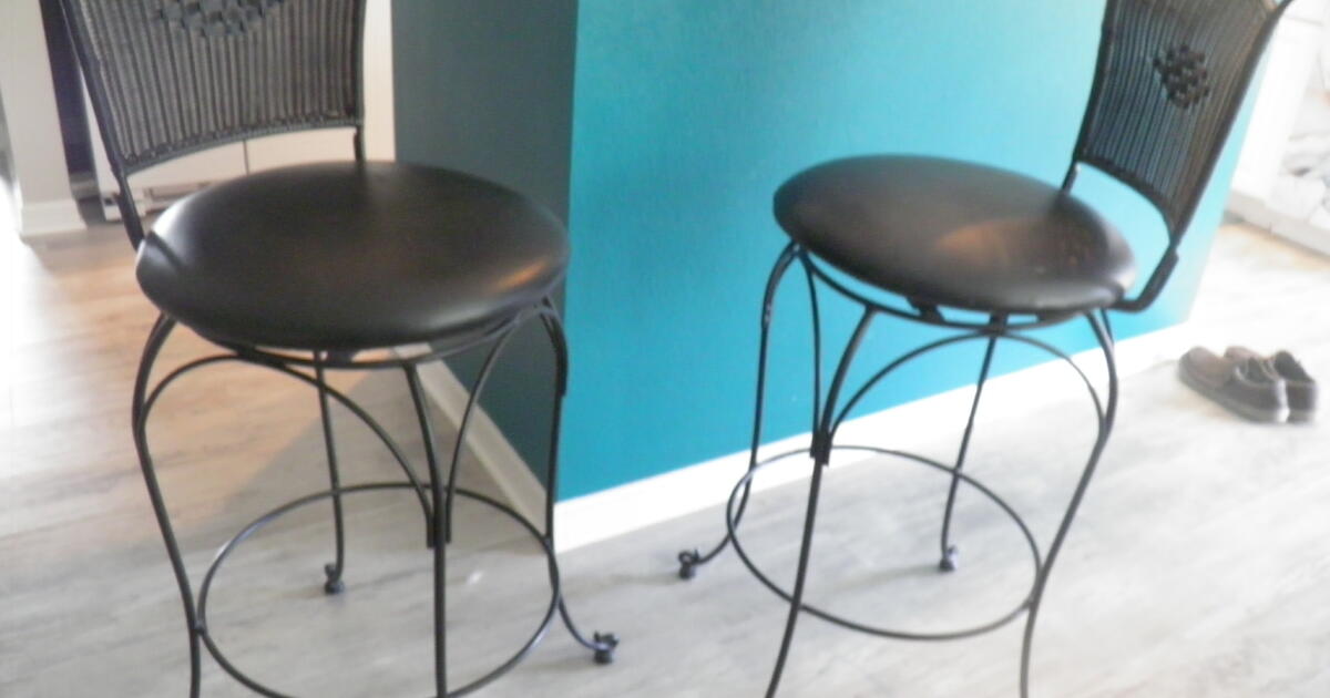 Two Wrought Iron Barstools with padded seats. for 30 in Lady Lake, FL
