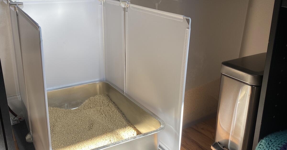 FREE 2 litter boxes, 2 mats, a scoop, and a container of Worlds Best