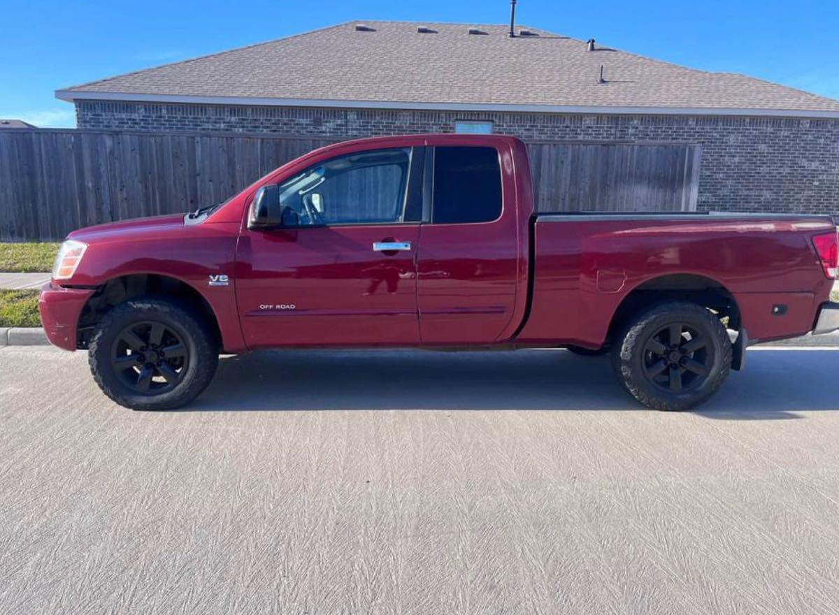2004 Nissan Titan Crew Cab · LE Pickup 4D 5 1/2 ft for 4500 in