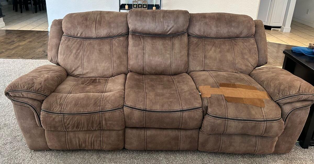 Great for a game room or man cave!! Dual reclining sofa and Rocker