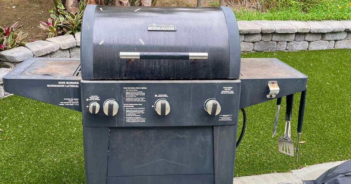 Propane BBQ with cover and 1/2 full tank for Free in Carlsbad, CA For