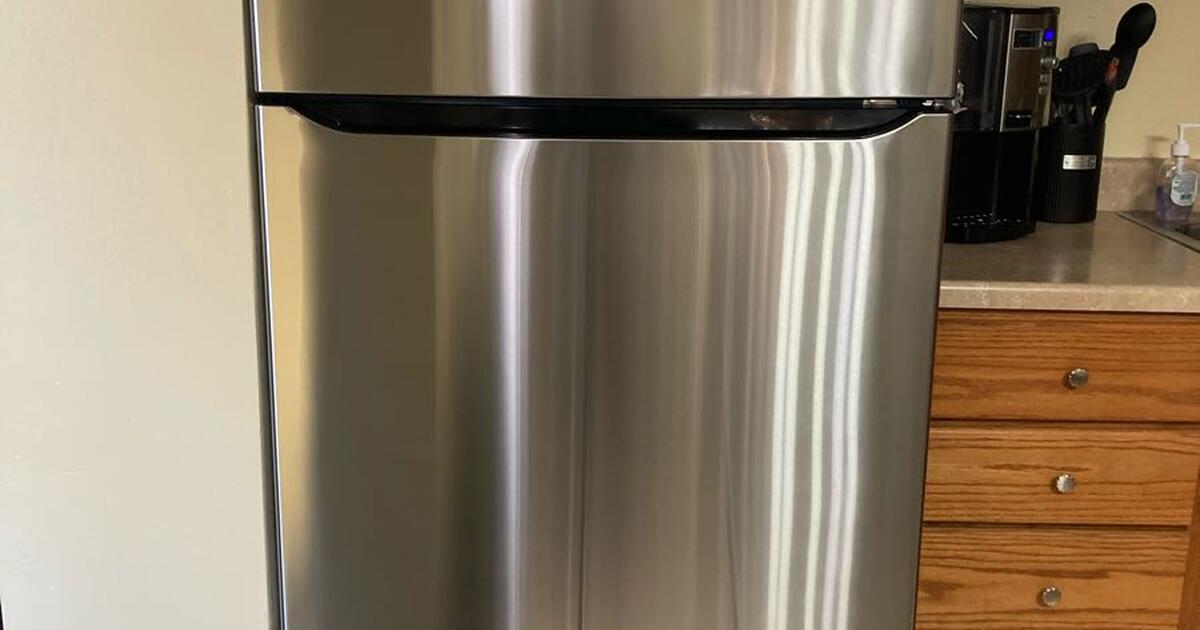 LG 24 cu. Ft. Top mount freezer refrigerator with Multi flow air symptom in stainless steel