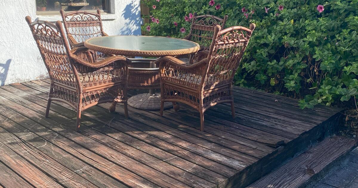 Wicker glass top table & chairs for Free in Sarasota, FL For Sale