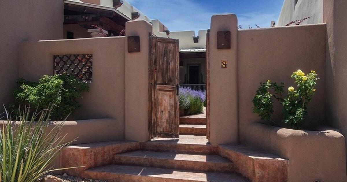 Bright, airy, Spanish style patio home located in Aldea de Santa Fe