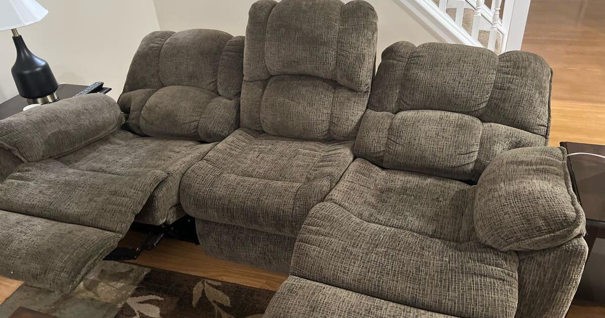 **pending pickup. **** free. Couch with recliners Free pickup asap for
