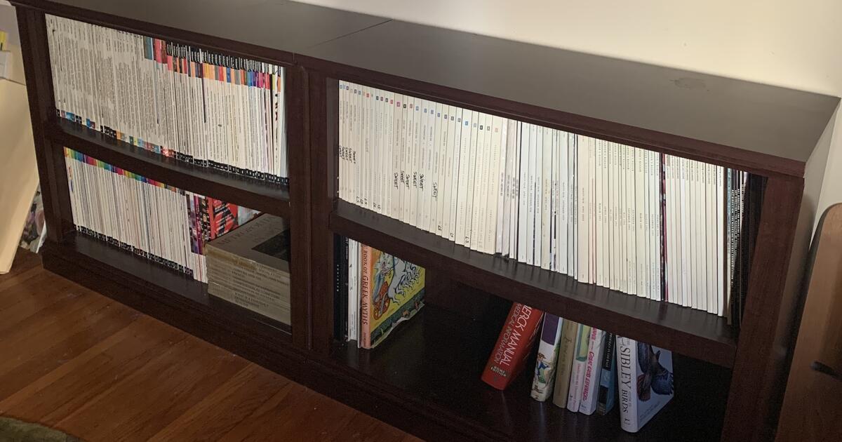 Two (2) Preowned assembled Cherry wood bookcases by Sauder for 40 in