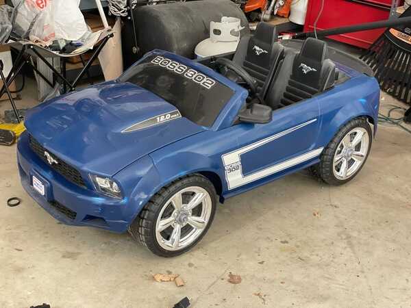Power wheels mustang boss sales