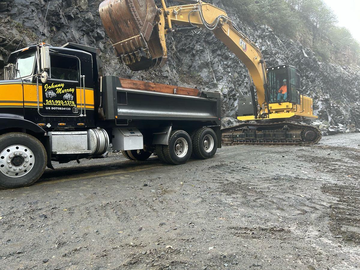 Johnny Murray Dump Trucking &Bob Cat Service 5419921378 call for free