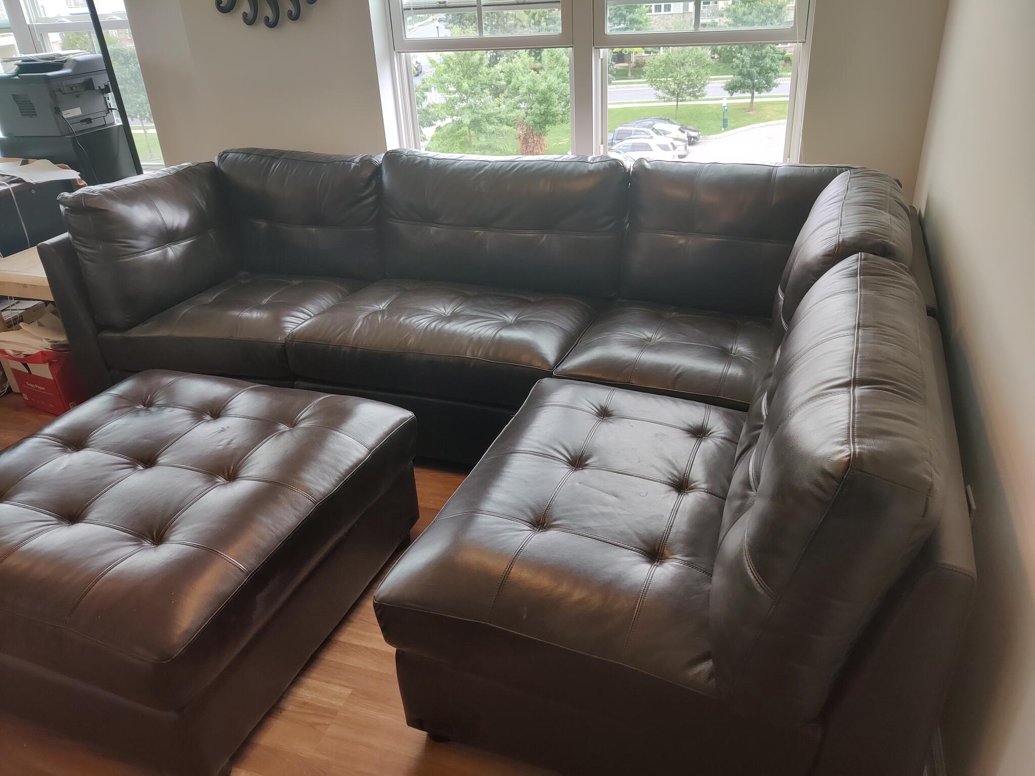 Calvin leather outlet modular sectional