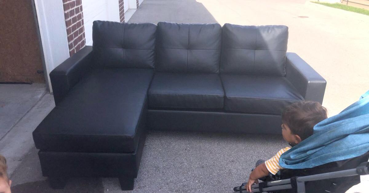 500 negotiable Black couch good condition. Like new delivery free in