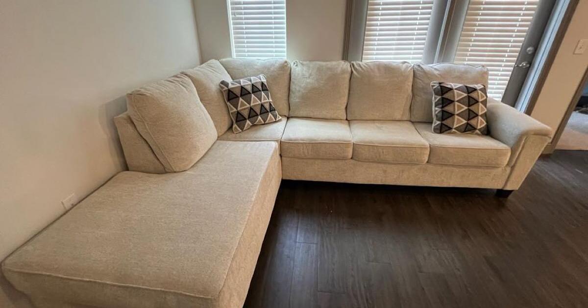 like-new-ashley-natural-cream-colored-two-piece-chaise-sectional-for