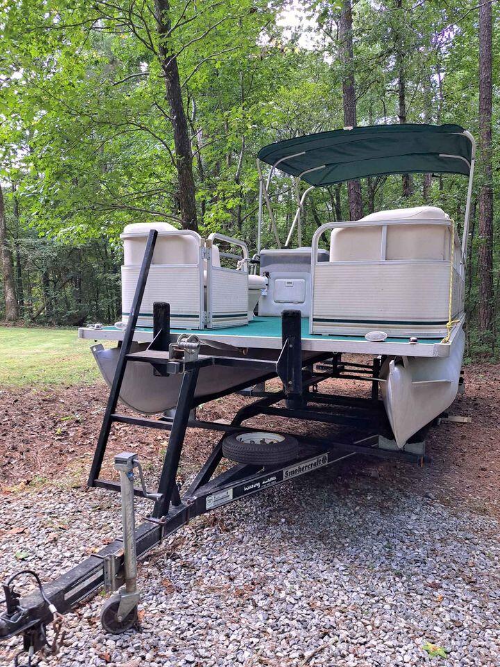 2002 Smokercraft Escape Pontoon Boat with bimini top for $8500 in
