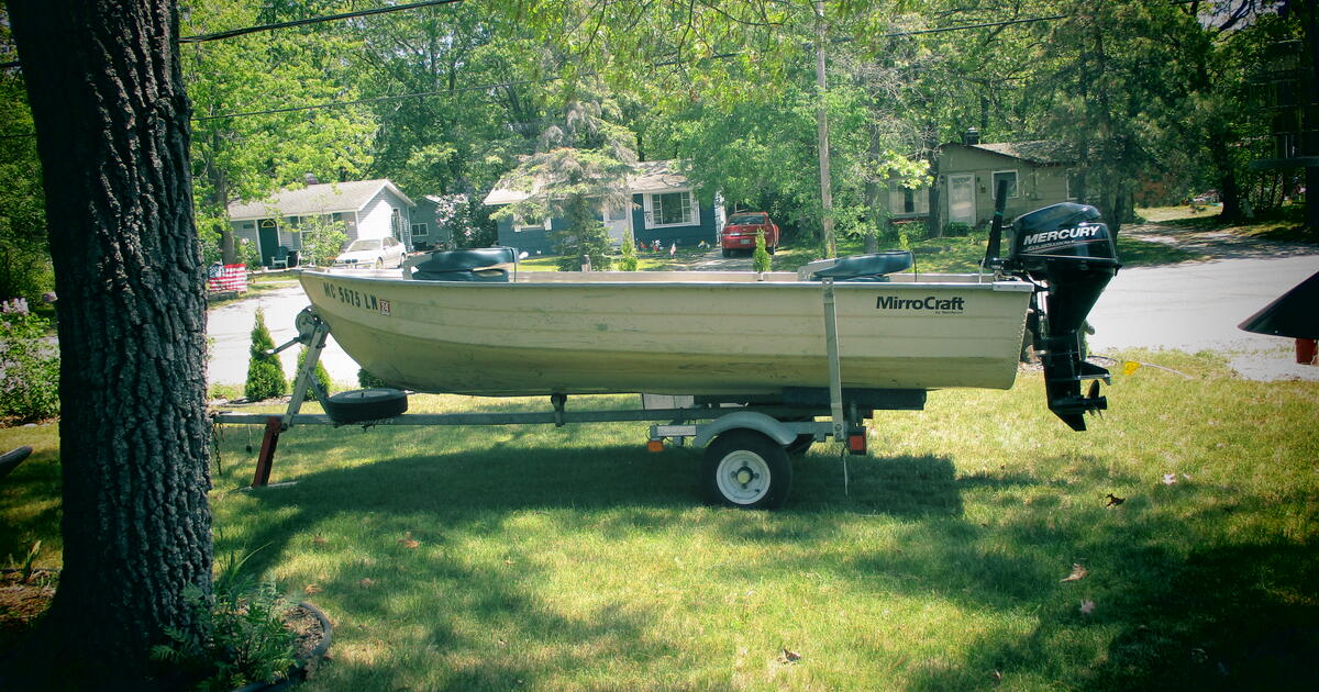 12 ft mirrocraft deep v boat, trailer and moter for 2100 in Oscoda, MI