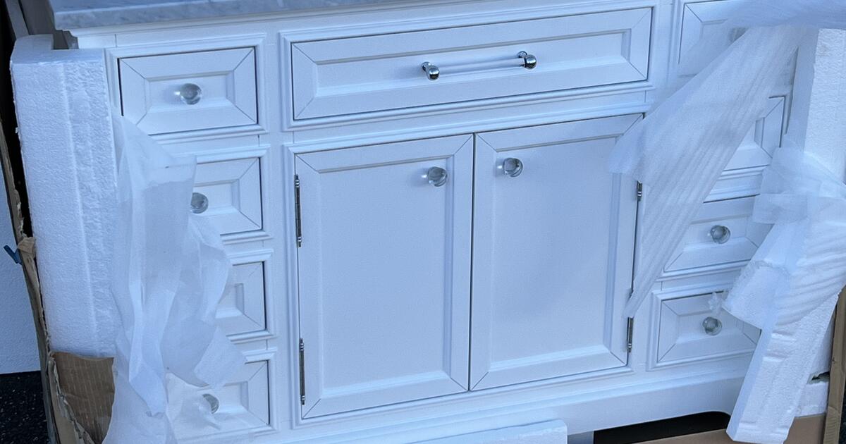 Brand new bathroom vanity, high quality plumbing fixtures and more for