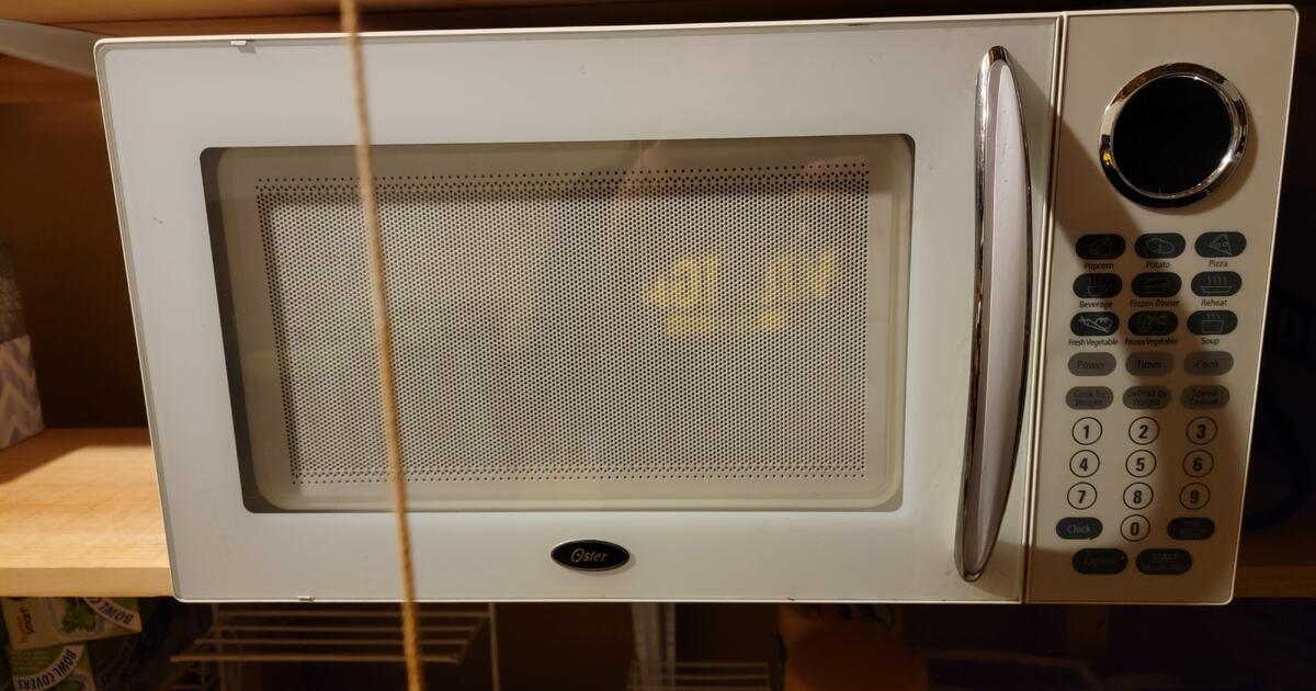 Oster 1.1 Cu Ft Microwave for 45 in Pinckney, MI For Sale & Free