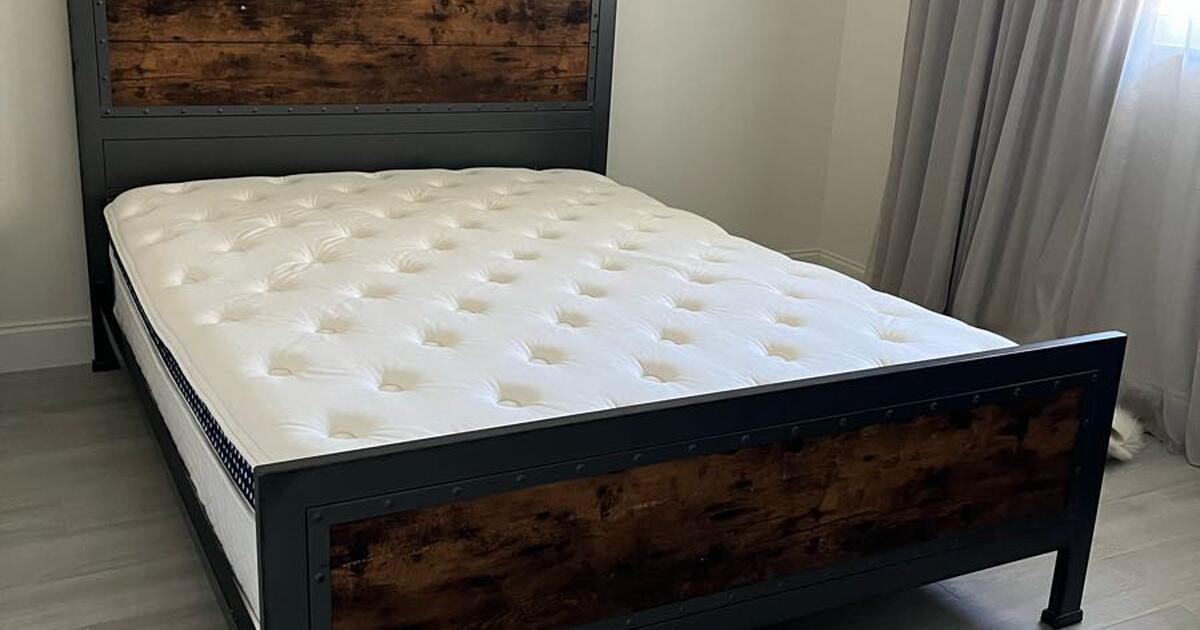 Queen size bed with Winkbed mattress. for 100 in Melbourne, FL For